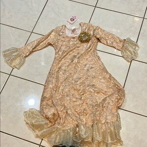 Elegant Gold and Cream Formal Gown with Flowing Skirt